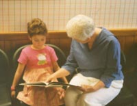 Grandmother being able to read to her granddaughter
